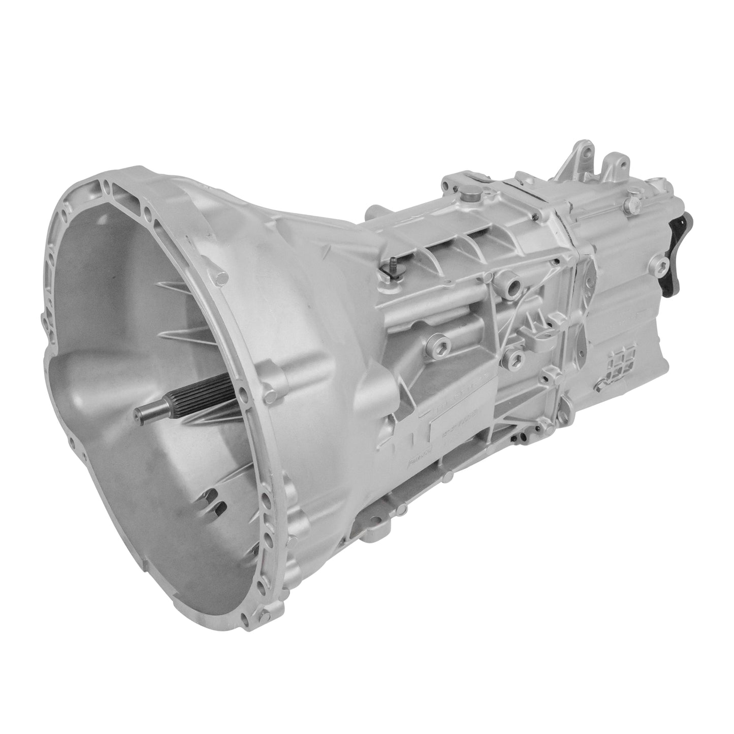 View of an MT-82 manual transmission. Part of the interior of the bell housing and input shaft are visible at the front, and part of the extension housing at the back.